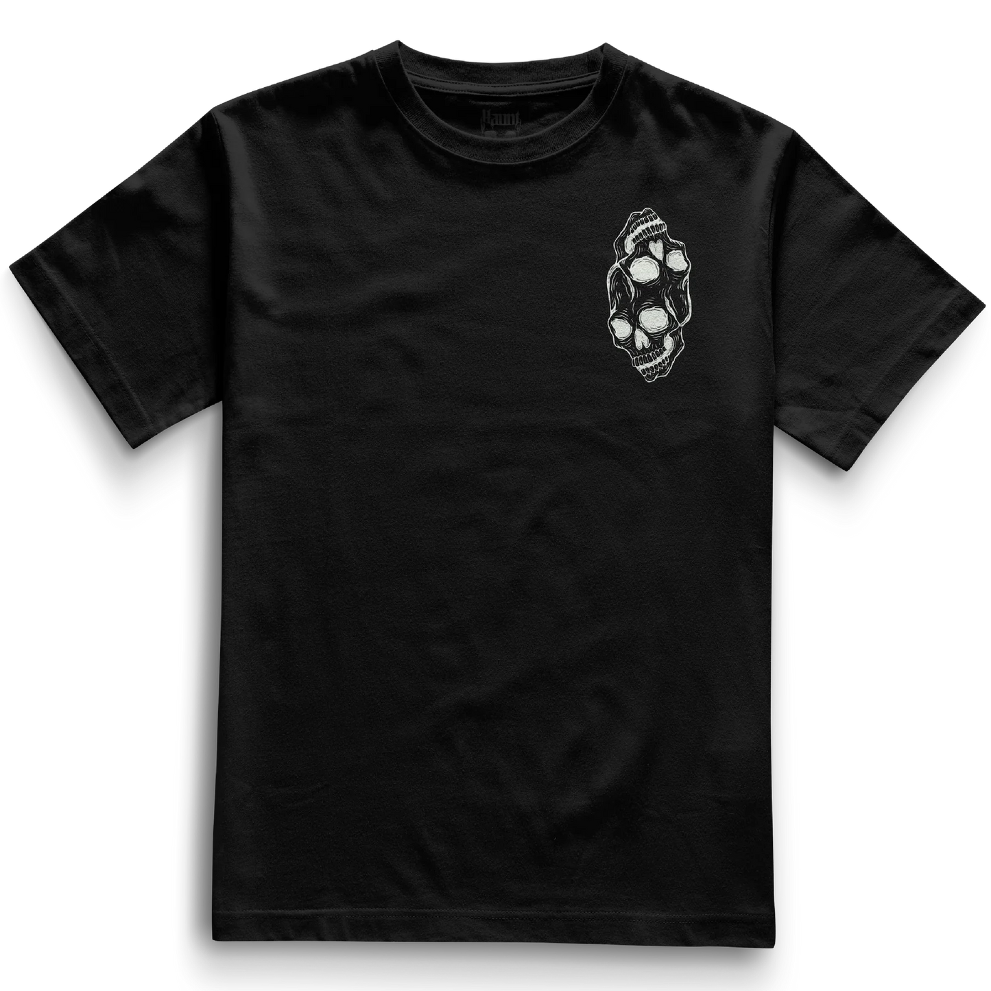 Front of the black Siamese Skulls t-shirt from Haunt’s Pocket Collection featuring two white skulls, one inverted, joined at the top in a bold tattoo-style design.