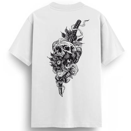 Back of the Katana Killer t-shirt featuring a skull with an eyeball in its mouth, pierced by a katana sword, surrounded by flower petals and banners in bold black and white traditional tattoo art.
