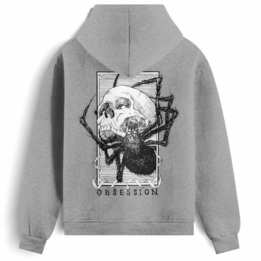 Back view of the Obsession hoodie from Haunt, showing a black and white tattoo-style skull being devoured by a spider, with the word “OBSESSION” beneath the design.