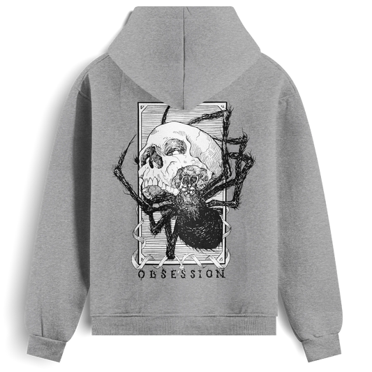 Back view of the grey Obsession hoodie from Haunt, showing a black and white tattoo-style skull being devoured by a spider, with the word “OBSESSION” beneath the design.