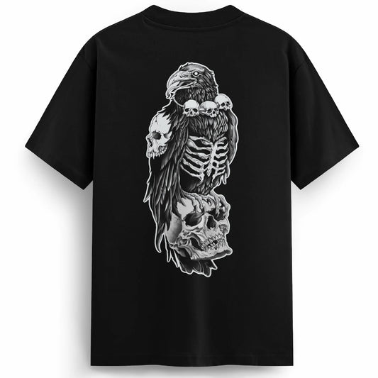 Back of the Bone Collector tee with a gothic tattoo-style design: a black crow wearing a skull necklace perched atop a larger skull, rib cage exposed, symbolising death and mystery in intricate detail.
