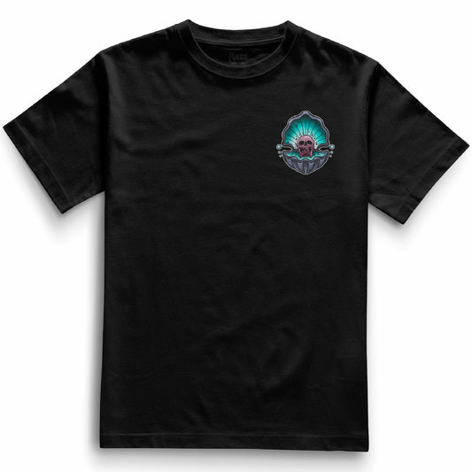 Cursed Pearl Pocket Tee in black, displaying a front-facing design of a skull within an oyster shell. Bold, traditional tattoo style on a relaxed fit heavyweight t-shirt.