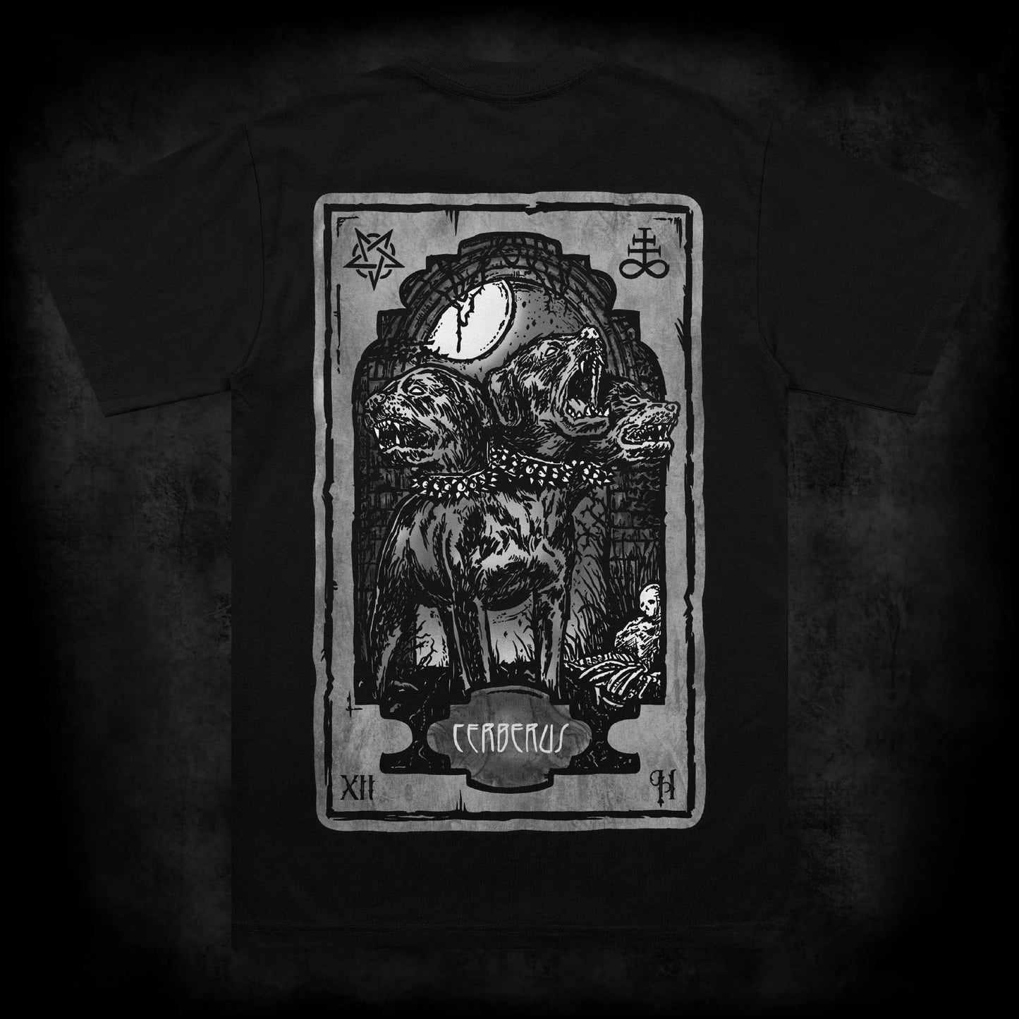 Back view of the Cerberus occult t-shirt featuring a large tattoo-style print of Cerberus, the three-headed hound, beneath a crescent moon with gothic arch details on a black heavyweight garment.