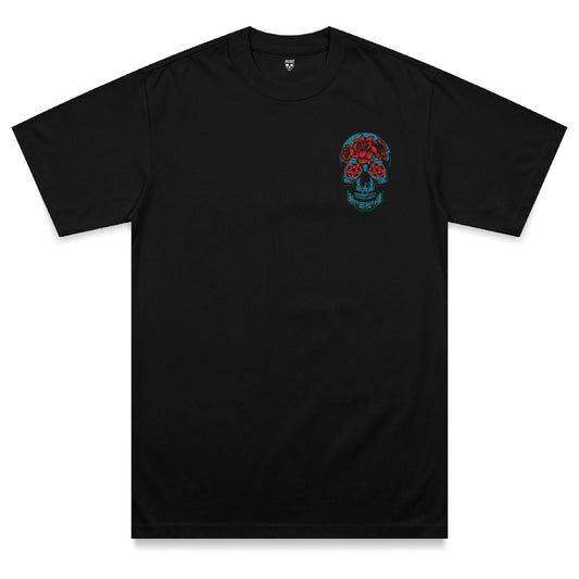 Front view of the Hexed heavyweight t-shirt featuring a bright blue skull chest print with red pentagram eyes and floral tattoo-inspired detailing on a black heavyweight garment.