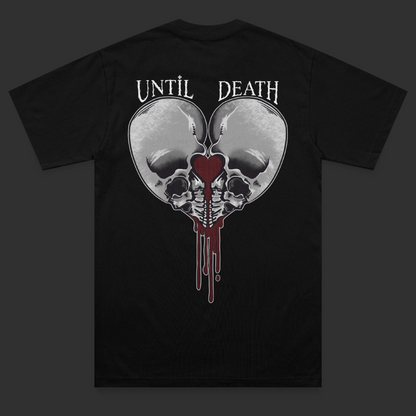 Back view of the Love Kills heavyweight t-shirt featuring a large mirrored skull back print forming a heart shape with dripping blood red detailing and sharp stylised Until Death lettering on a black heavyweight garment.