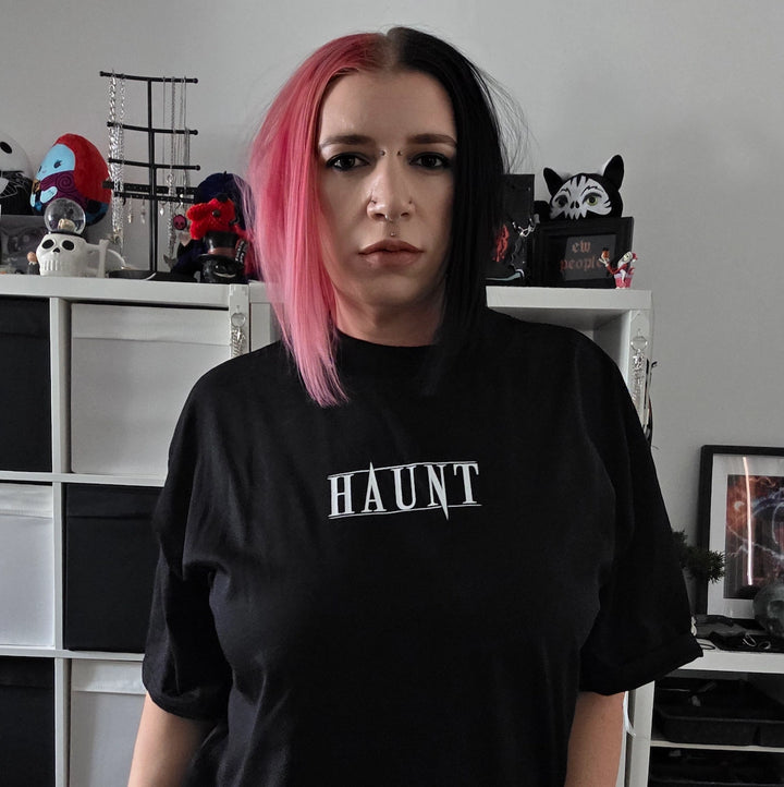 Sam wearing Haunt Love Kills t-shirt with logo visible, alternative fashion