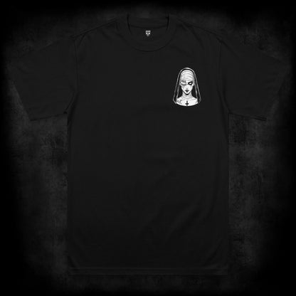 Front view of the Mother Malice occult t-shirt featuring a small left chest print of a sinister bandaged nun with one stitched eye, one hollow pupil and an inverted cross detail on a black heavyweight garment.