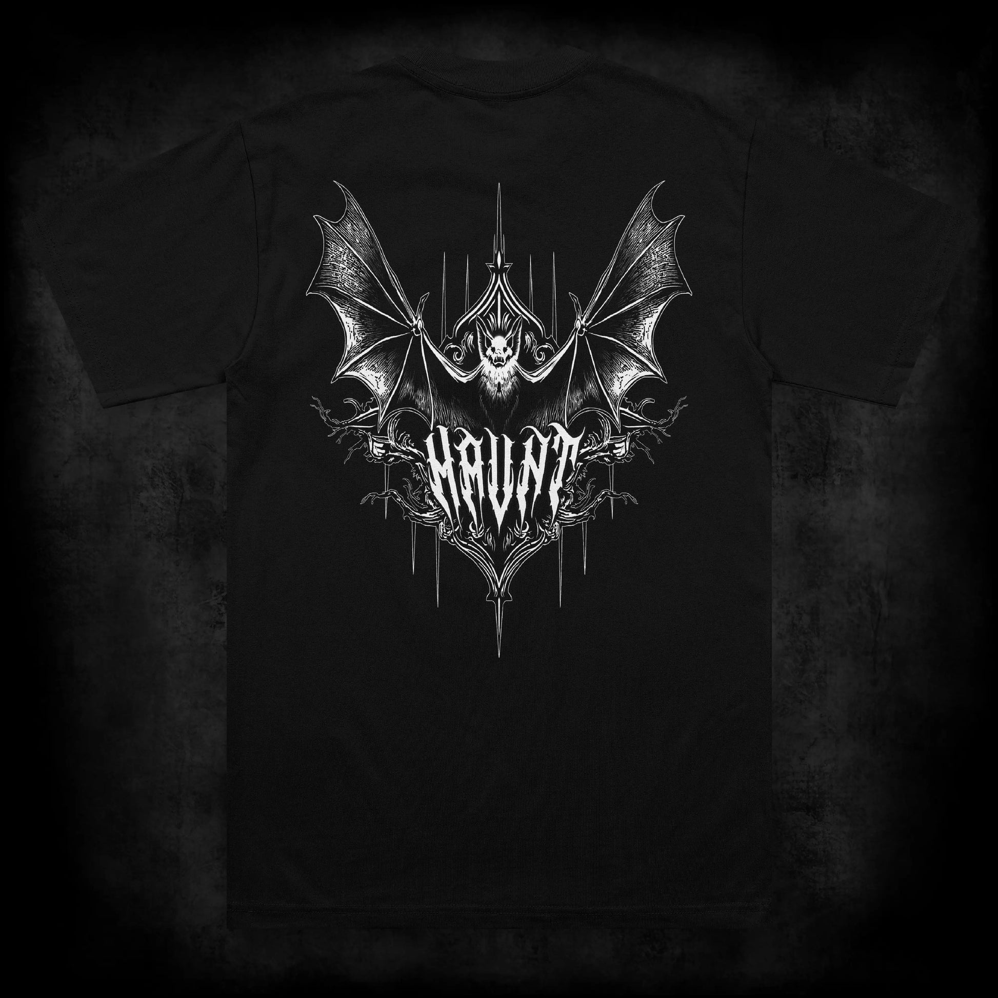 Back view of the Nocturne occult t-shirt featuring a large occult back print of a bat with spread wings above gothic Haunt lettering and thorn details on a black heavyweight garment.