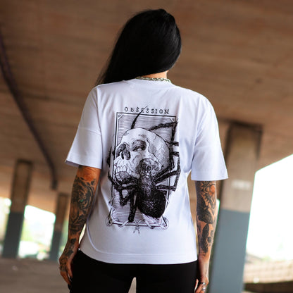 Back view of Haunt's Obsession premium t-shirt featuring a bold skull and spider illustration in black ink.