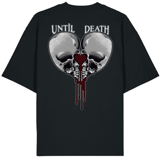 Back of the Love Kills tee with twin skulls framing a bleeding heart and the words “UNTIL DEATH” above in gothic tattoo lettering.