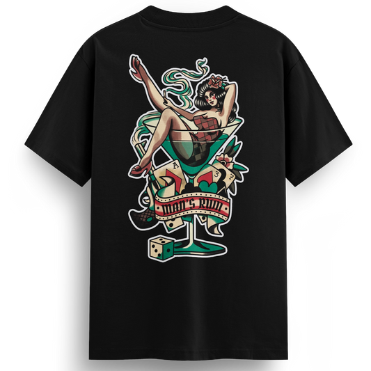 Back of the Man’s Ruin t-shirt showing a vintage-style tattoo design of a lady lounging in a martini glass with a gun, cigarette, and dice, in full-color traditional ink style.
