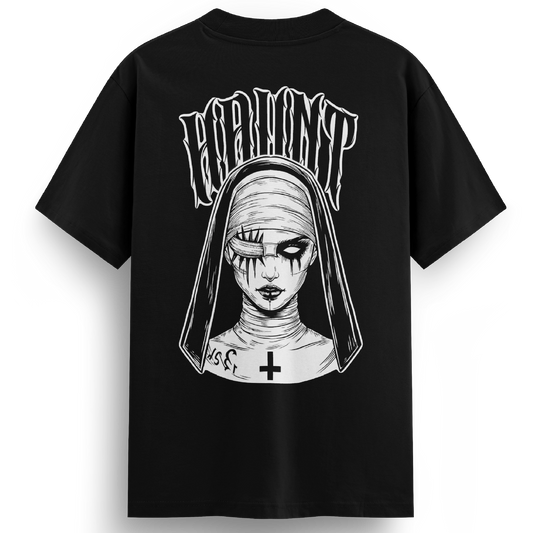 Front of the Mother Malice oversized t-shirt featuring a large back print of a sinister nun with stitched eyes, hollow pupils, and a gothic cross on her neck. “HAUNT” arches above the design in warped lettering.