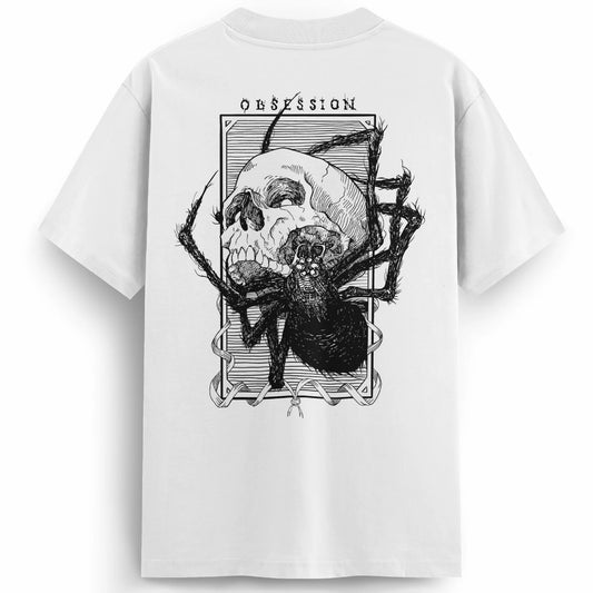 Back of the Obsession white t-shirt showcasing a bold black linework tattoo-style illustration of a skull being devoured by a spider, framed with the word “OBSESSION” at the top.