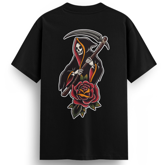 Back of the Reaper t-shirt displaying a vibrant full-colour tattoo-style grim reaper holding a scythe, with a traditional red rose beneath the design.
