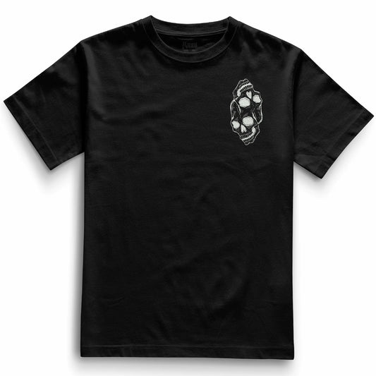 Front of the black Siamese Skulls t-shirt from Haunt’s Pocket Collection featuring two white skulls, one inverted, joined at the top in a bold tattoo-style design.
