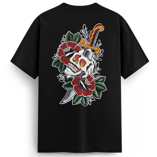 Front of the Skull Splitter oversized t-shirt featuring a bold back print featuring a skull split by a dagger, surrounded by deep red traditional roses and green leaves. Classic tattoo-style design with high contrast and vibrant detail.