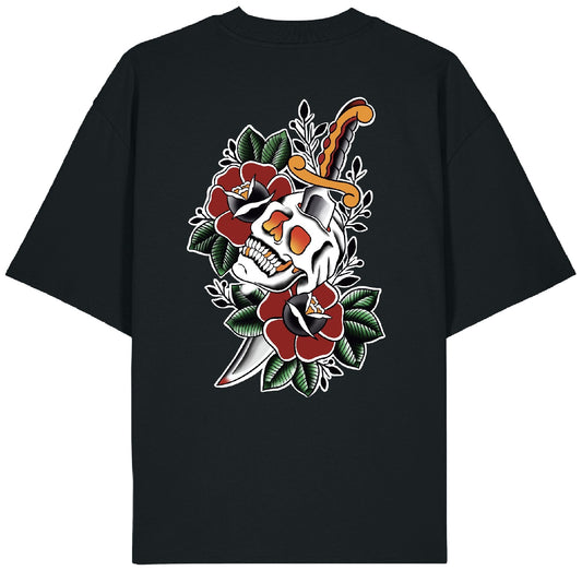 Back of the Skull Splitter tee showing a traditional skull pierced by a dagger and surrounded by colorful peonies in classic tattoo style.